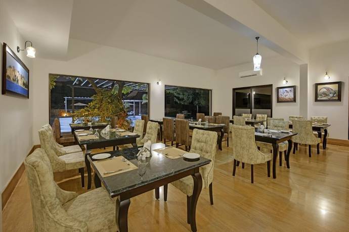 Imagen del bar/restaurante del Hotel The Hunting Lodge. Foto 8