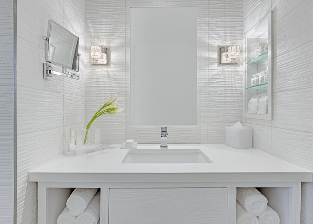 Imagen de la habitación del Hotel The Huntley. Foto 9