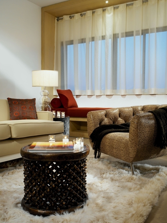 Imagen de la habitación del Hotel The Huntley. Foto 12