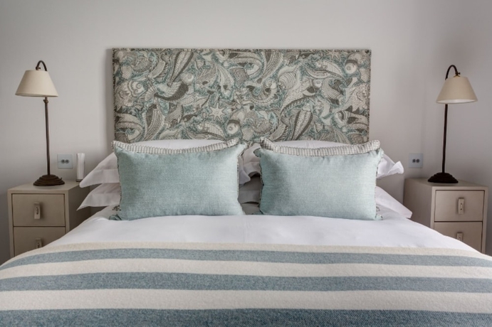 Imagen de la habitación del Hotel The Idle Rocks. Foto 6