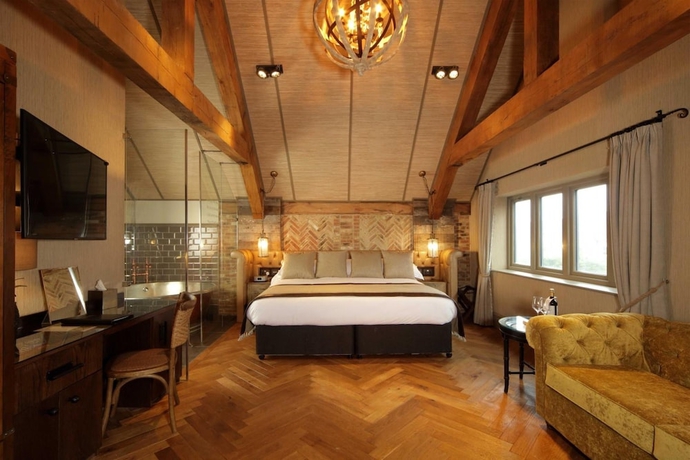 Imagen de la habitación del Hotel The Impeccable Pig. Foto 14