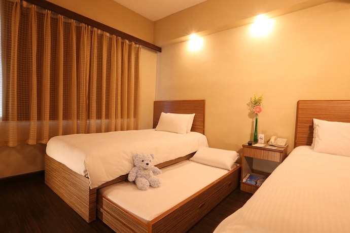 Imagen de la habitación del Hotel The Imperial, Kowloon. Foto 7