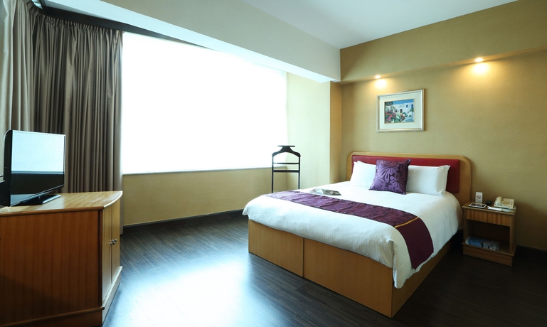 Imagen de la habitación del Hotel The Imperial, Kowloon. Foto 11