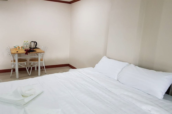 Imagen de la habitación del Hotel The Infinity 62. Foto 13