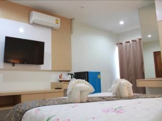 Imagen de la habitación del Hotel The Infinity Suite Chiang Rai. Foto 4