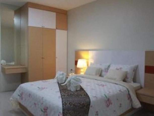 Imagen de la habitación del Hotel The Infinity Suite Chiang Rai. Foto 6