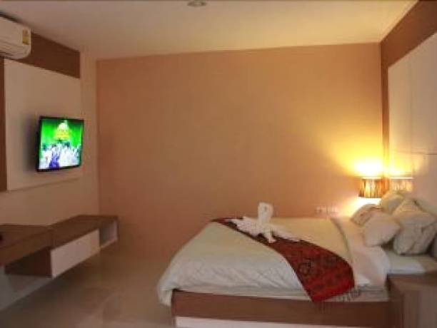 Imagen de la habitación del Hotel The Infinity Suite Chiang Rai. Foto 7