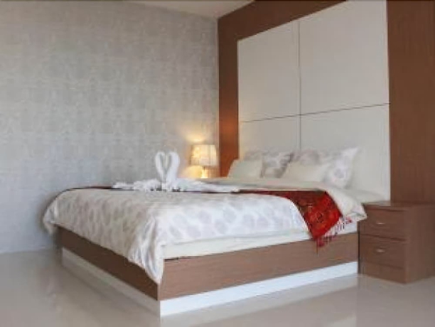 Imagen de la habitación del Hotel The Infinity Suite Chiang Rai. Foto 8