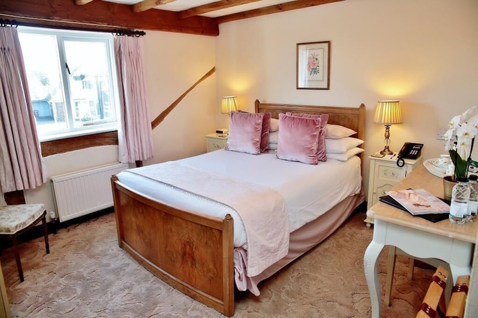 Imagen de la habitación del Hotel The Inglenook. Foto 9