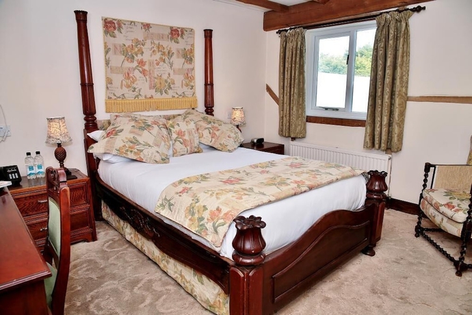 Imagen de la habitación del Hotel The Inglenook. Foto 11