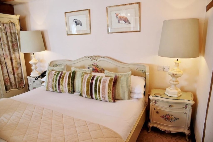 Imagen de la habitación del Hotel The Inglenook. Foto 14
