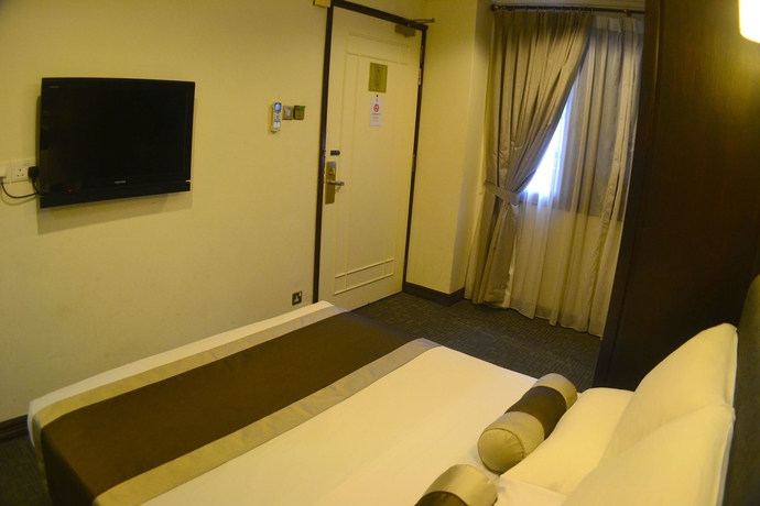 Imagen de la habitación del Hotel The Inn At Temple Street. Foto 5