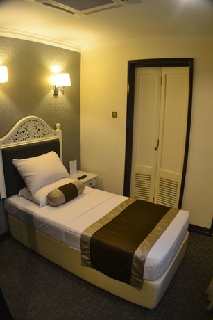 Imagen de la habitación del Hotel The Inn At Temple Street. Foto 7