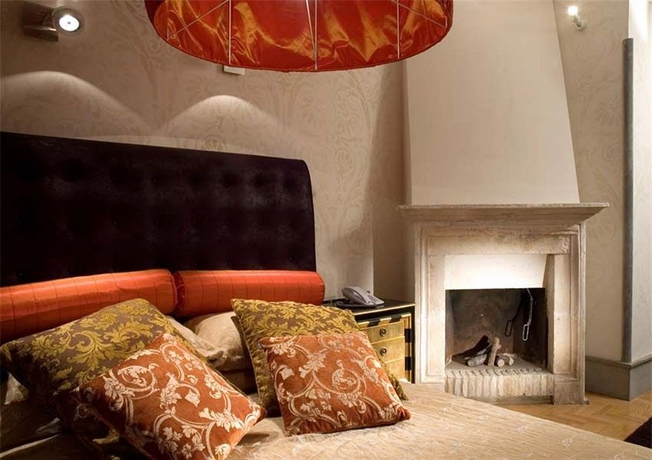 Imagen de la habitación del Hotel The Inn At The Roman Forum. Foto 5