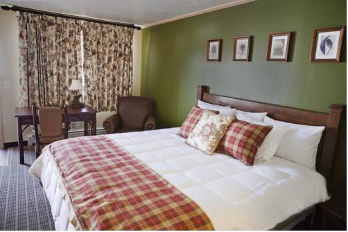 Imagen de la habitación del Hotel The Inn At Tomichi Village. Foto 6