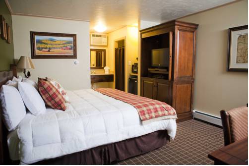 Imagen de la habitación del Hotel The Inn At Tomichi Village. Foto 7