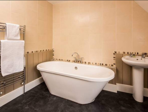 Imagen de la habitación del Hotel The Inn At Woodhall Spa. Foto 12