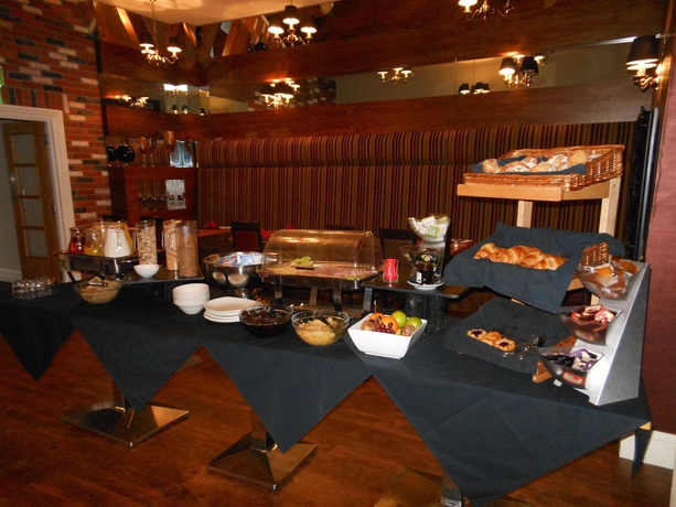Imagen del bar/restaurante del Hotel The Inn Boutique. Foto 2