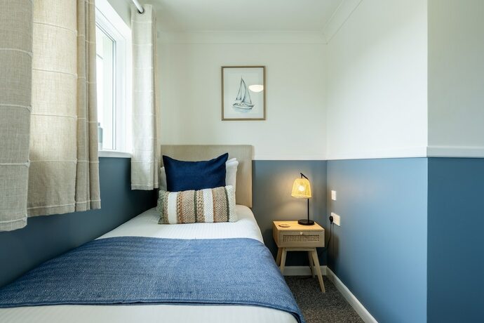 Imagen de la habitación del Hotel The Inn For All Seasons. Foto 16