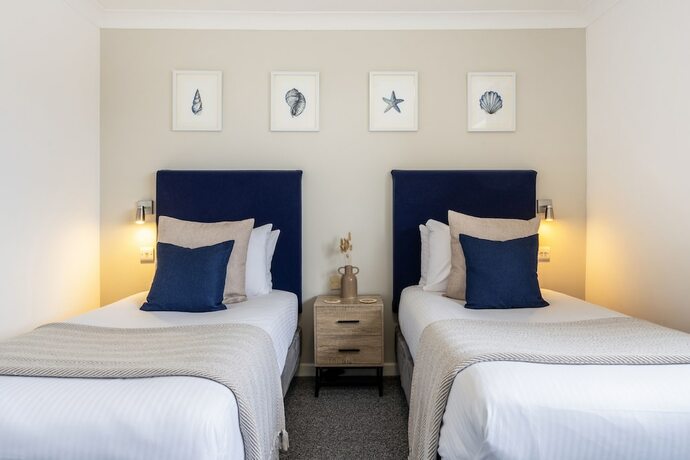 Imagen de la habitación del Hotel The Inn For All Seasons. Foto 17