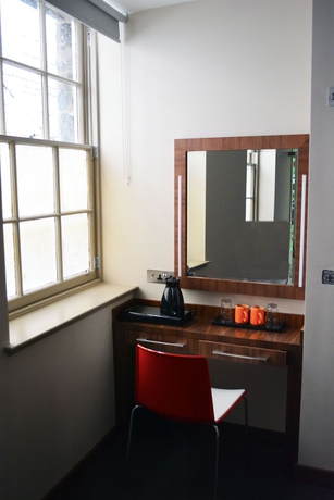 Imagen de la habitación del Hotel The Inn Place. Foto 7