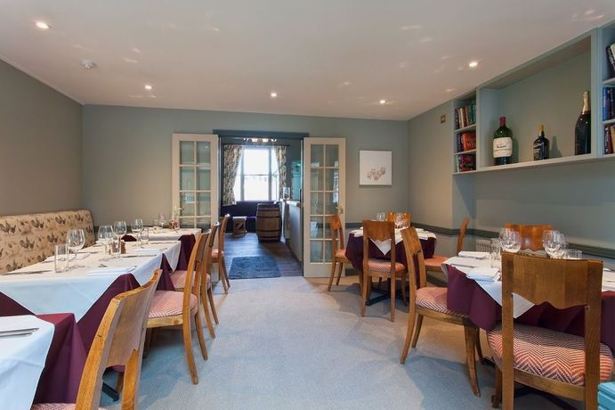 Imagen del bar/restaurante del Hotel The Inn West End. Foto 6