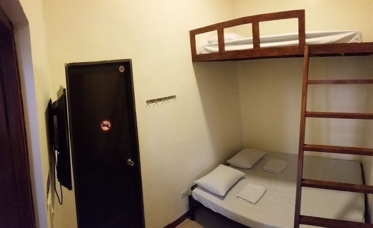 Imagen de la habitación del Hotel The Inn at Calayo. Foto 10