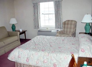 Imagen de la habitación del Hotel The Inn at Mill Falls. Foto 4