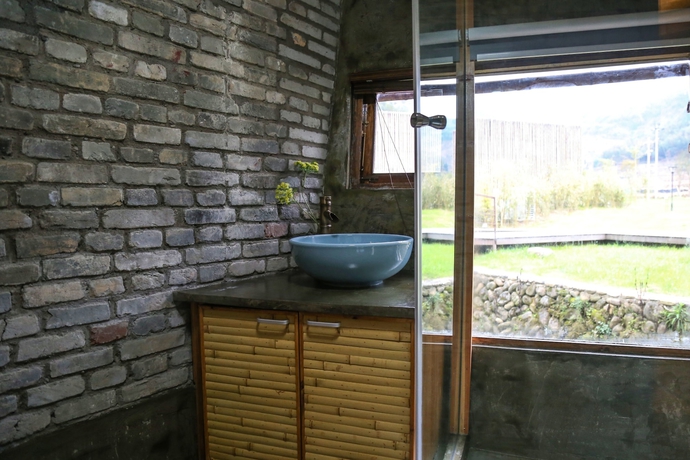 Imagen de la habitación del Hotel The International Cultural and Creative Bamboo Village. Foto 3