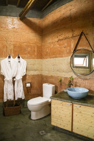 Imagen de la habitación del Hotel The International Cultural and Creative Bamboo Village. Foto 6