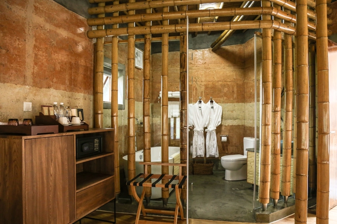 Imagen de la habitación del Hotel The International Cultural and Creative Bamboo Village. Foto 7