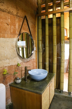 Imagen de la habitación del Hotel The International Cultural and Creative Bamboo Village. Foto 16