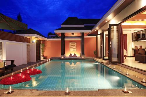 Imagen de la habitación del Hotel The Iris Pool Villa. Foto 3