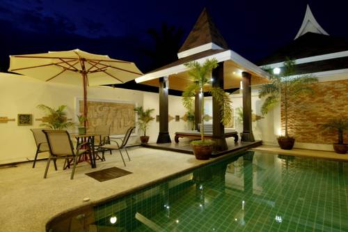 Imagen de la habitación del Hotel The Iris Pool Villa. Foto 5