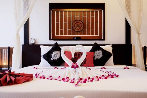 Imagen de la habitación del Hotel The Iris Pool Villa. Foto 6