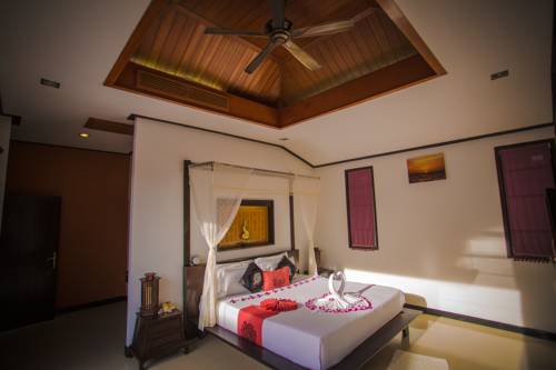 Imagen de la habitación del Hotel The Iris Pool Villa. Foto 9