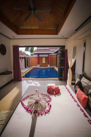 Imagen de la habitación del Hotel The Iris Pool Villa. Foto 13