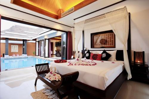 Imagen de la habitación del Hotel The Iris Pool Villa. Foto 15