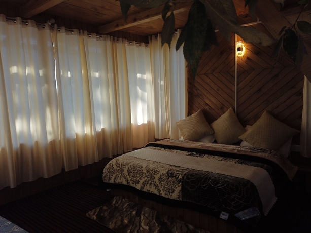 Imagen de la habitación del Hotel The Isisinga. Foto 3