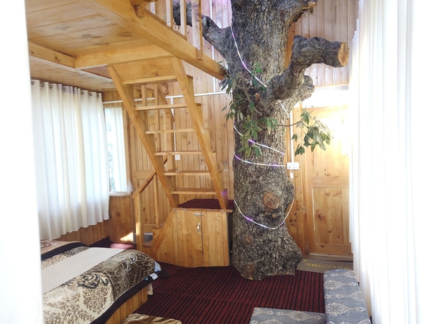 Imagen de la habitación del Hotel The Isisinga. Foto 5