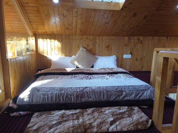 Imagen de la habitación del Hotel The Isisinga. Foto 9