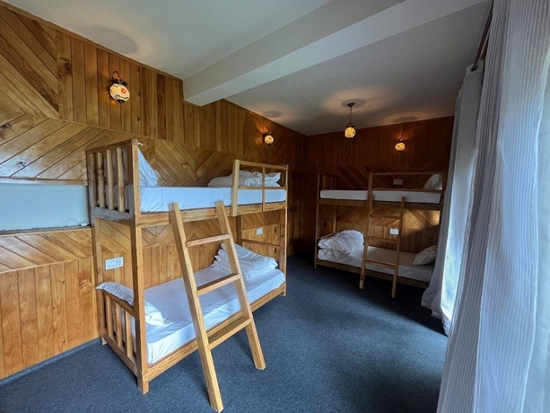 Imagen de la habitación del Hotel The Isisinga. Foto 13