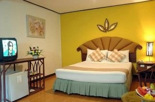Imagen de la habitación del Hotel The Island Resort & Spa. Foto 5