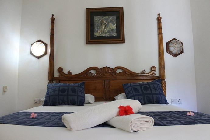 Imagen de la habitación del Hotel The Islander, Anse Kerlan. Foto 9