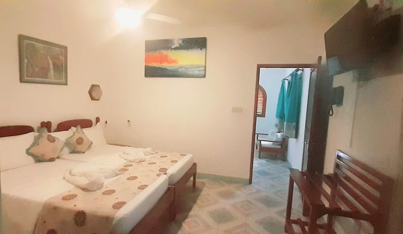 Imagen de la habitación del Hotel The Islander, Anse Kerlan. Foto 10