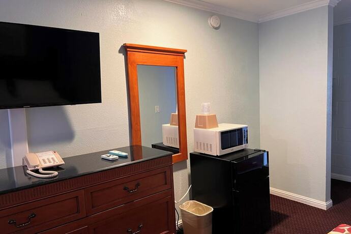 Imagen de la habitación del Hotel The Islander Motel Santa Cruz. Foto 11