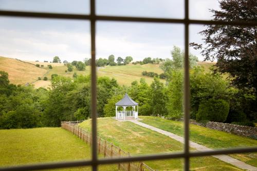 Imagen de la habitación del Hotel The Izaak Walton Country House. Foto 7
