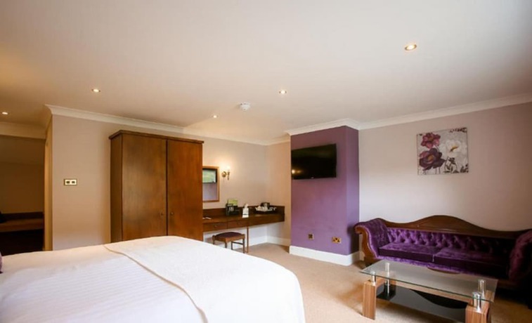 Imagen de la habitación del Hotel The Izaak Walton. Foto 4