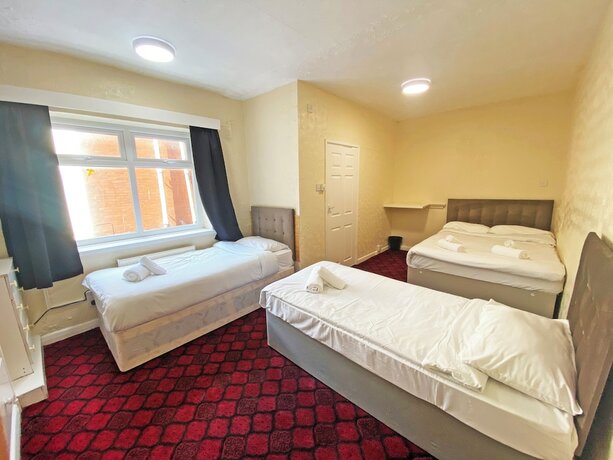 Imagen de la habitación del Hotel The J and S. Foto 13