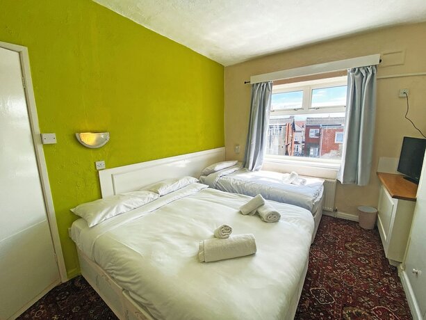 Imagen de la habitación del Hotel The J and S. Foto 15